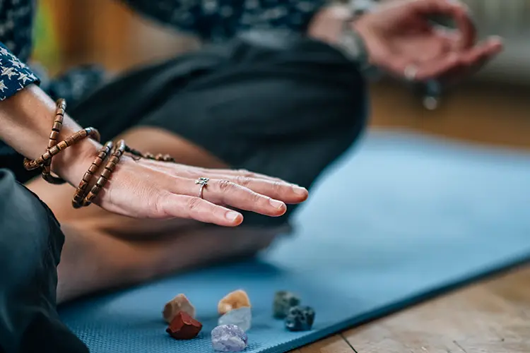 Imagery representing the body's energy centres discussed in reiki and yoga traditions